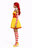 Person wearing a yellow and red costume with striped socks on a white background