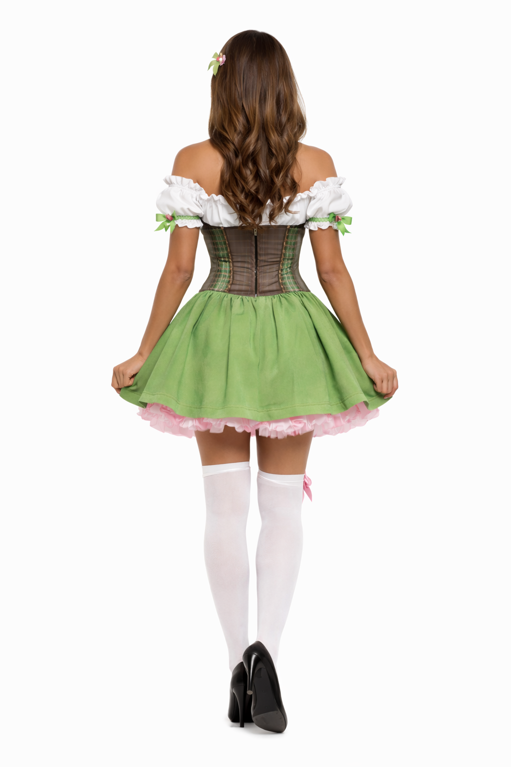 Woman wearing a green and white beer girl costume with a white background