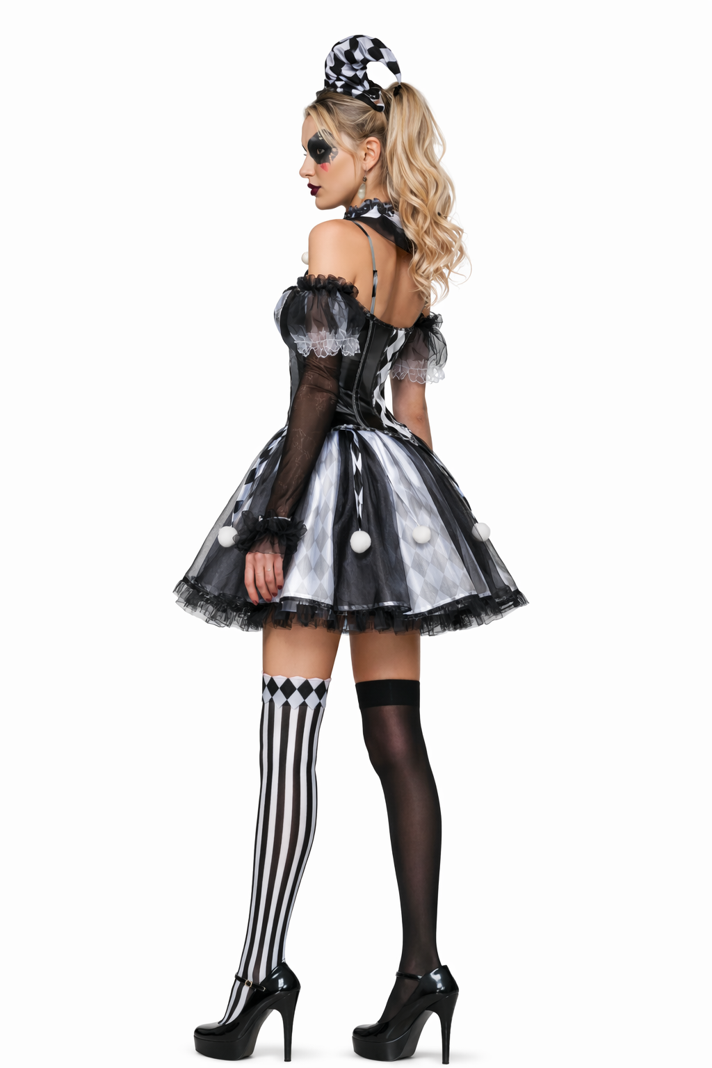 Person wearing a black and white clown costume on a white background