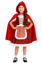 Child wearing a Little Red Riding Hood costume on a white background