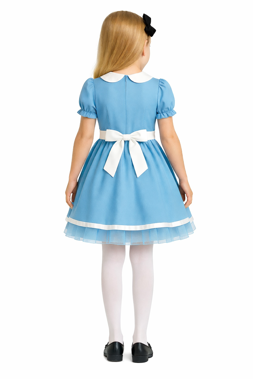 Child wearing a blue dress with white trim on a white background