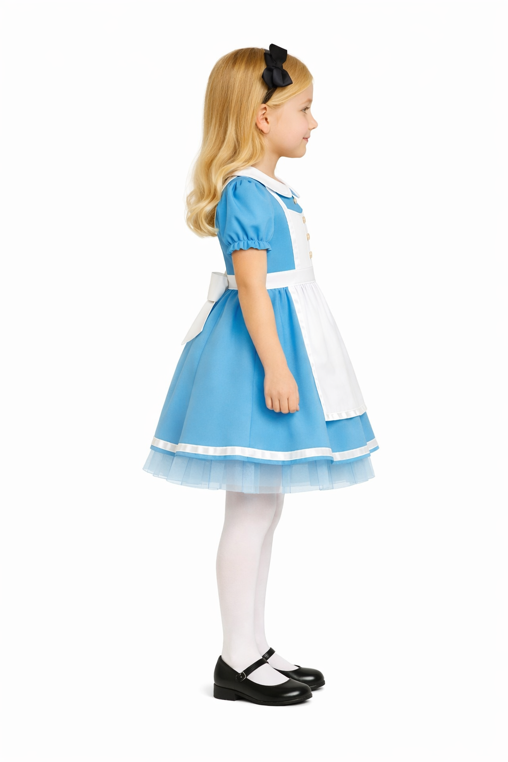 Child wearing a blue and white dress with a black headband on a white background