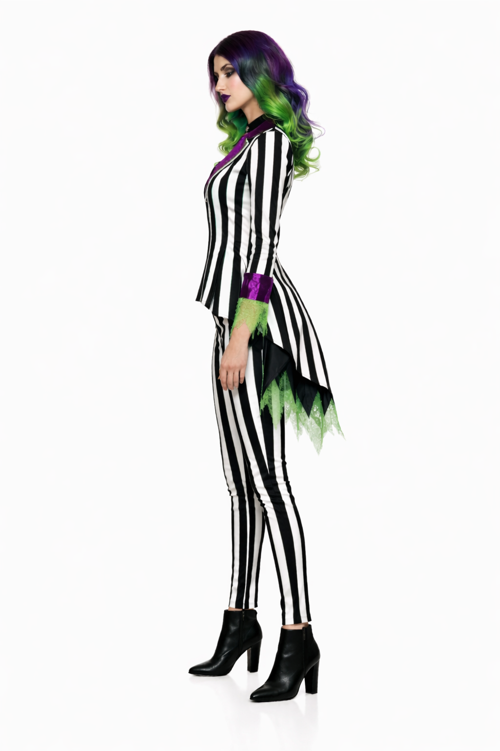 Person wearing a black and white striped costume with green accents on a white background